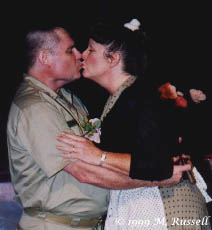 Colonel Puddlepont and wife share a tender moment